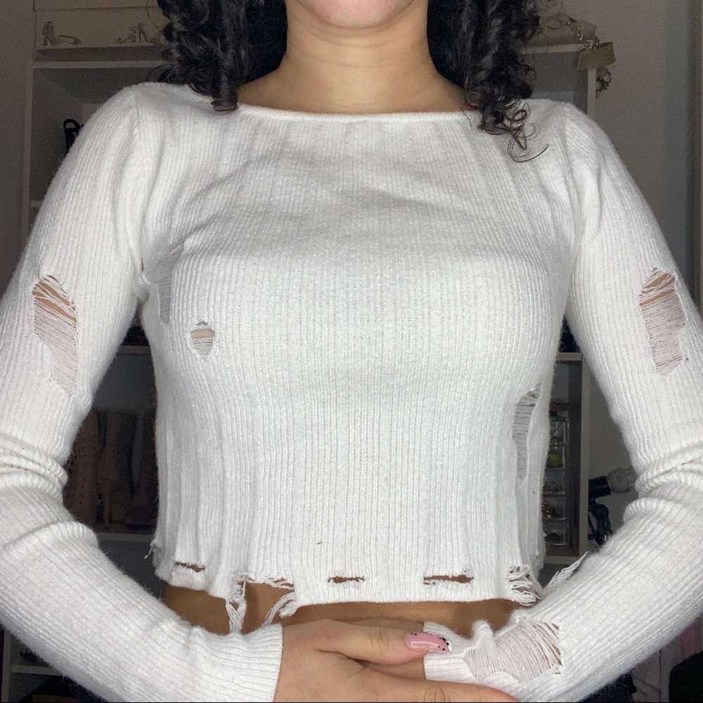 Distressed rubbed crop sweater